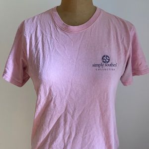 Pink short sleeve shirt, stretchy material.